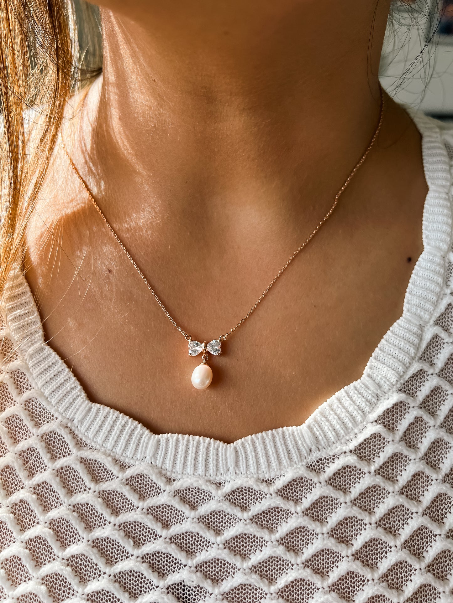 Bow Charm Pearl Pendant Necklace in Rose Gold